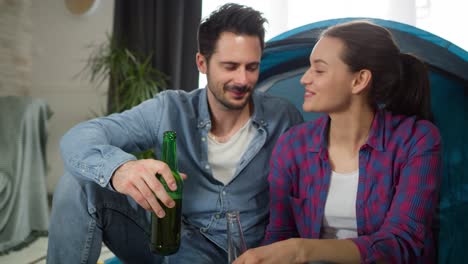 zoom in video of couple on a camping at home