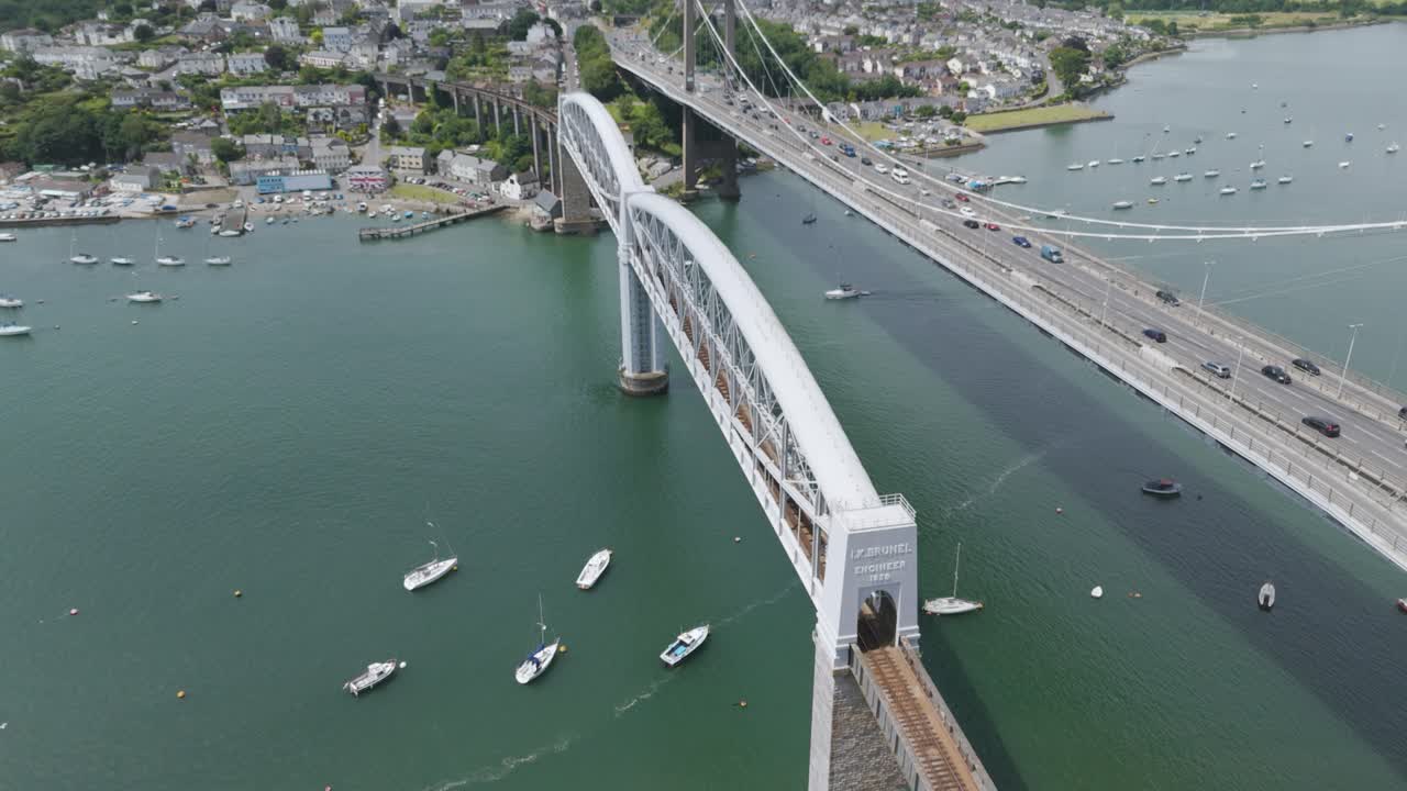 Aerial View of the Royal Albert Bridge and Tamar Bridge Spanning the River with Boats