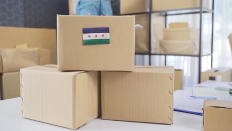 free syria flag on logistic cargo package.