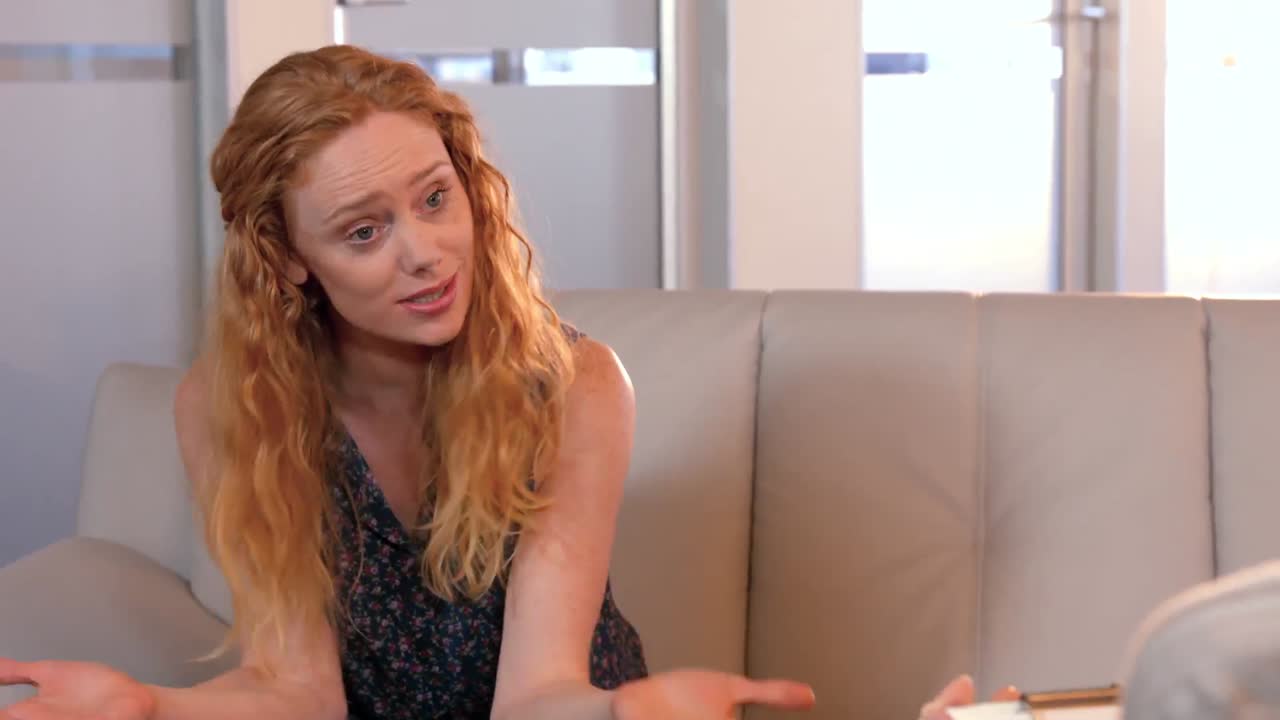 Casual businesswoman speaking with psychologist