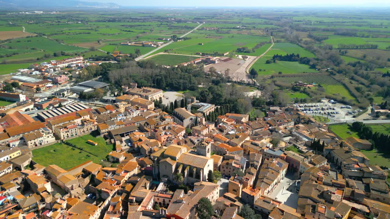 Peralada high angle view of peralada, a small town in catalonia, spain, highlighting the prominent castell de peralada and the surrounding agricultural landscape and urban areas