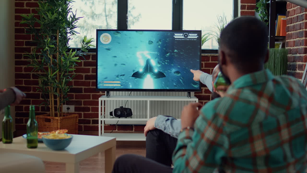 Diverse people having fun with video games challenge