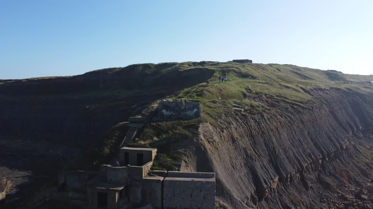 Aerial View of Coastal Ruins and Cliffs