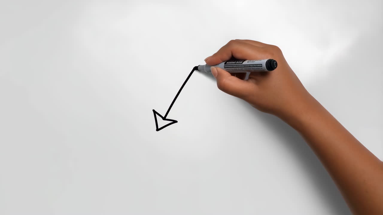 Hand drawing a downward arrow with a marker pen