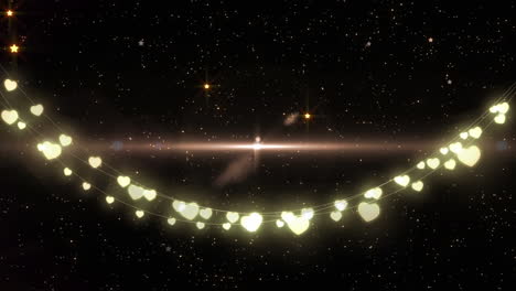 animation of glowing strings of fairy lights and glittering stars