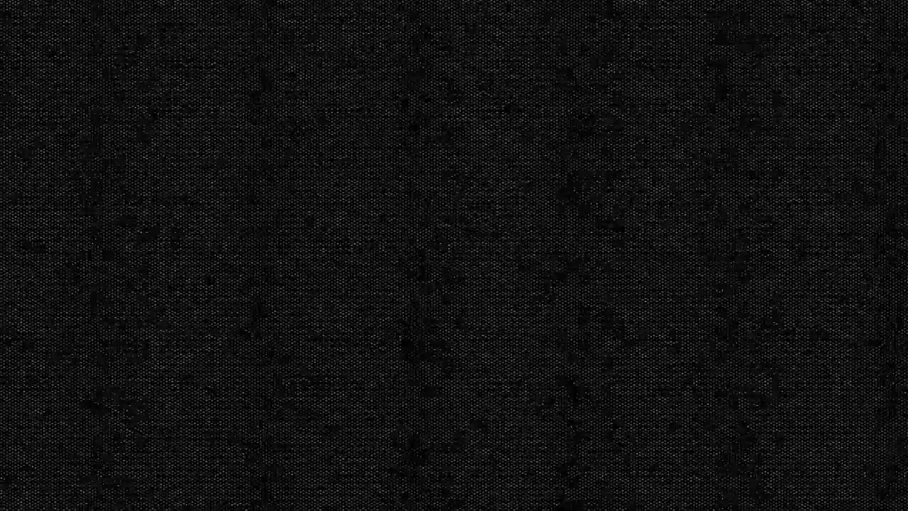 Detailní textura tmavě černé látky