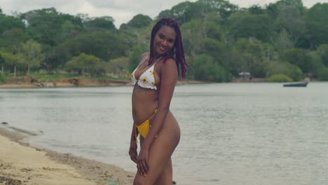 young woman in a bikini enjoying a tropical beach