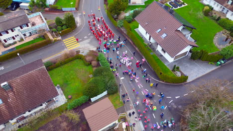 Aerial-of-Neighborhood-Children's-Carnival,-Location-Bergdietikon,-Greater-Zurich-Area,-Switzerland