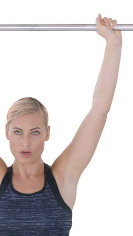 woman lifting dumbbell weights