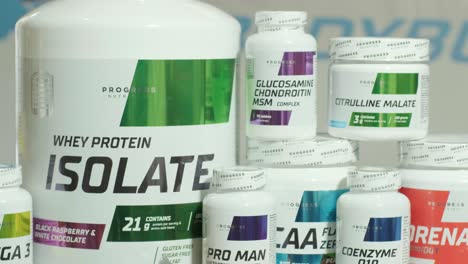 sport nutrition store interior with large choice of nutritional supplements.