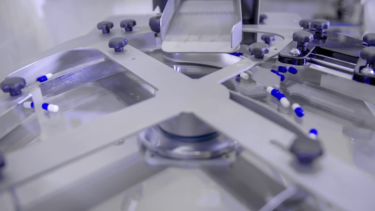 Slow motion of Blue pills for COVID-19 treatment spinning on a plate during counting process