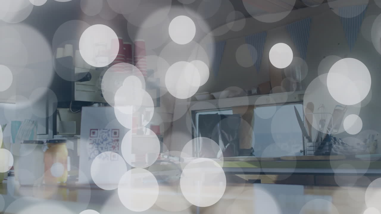 Kitchen counter with utensils and appliances, bokeh light effect animation