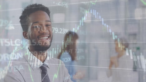 animation of graphs, changing numbers, trading board, smiling biracial man standing arms crossed