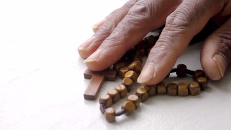 praying-to-god-with-cross-in-hands-together-with-cross-stock-footage