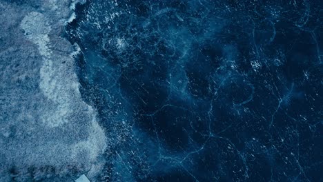 indre fosen, trondelag county, norway - the frost-coated shoreline of omundvatnet - aerial drone shot