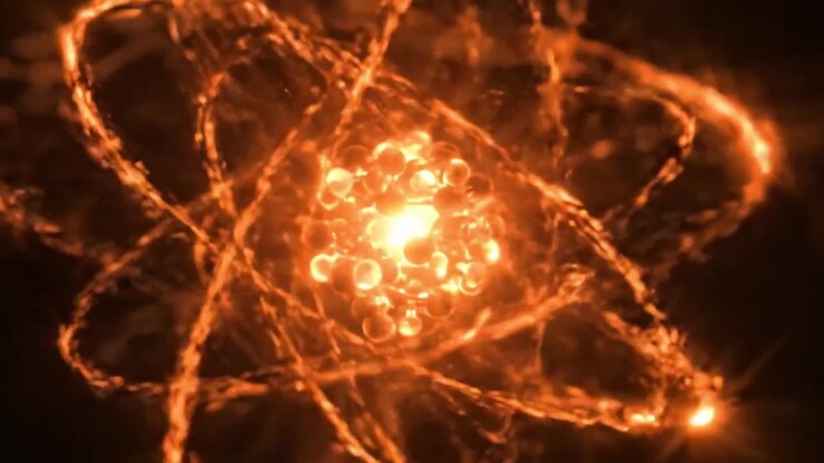 Visualização Dinâmica de uma Estrutura Atômica Brilhante Exibindo Elétrons e Núcleo em uma Exibição Energizada e Radiante de Energia Atômica.