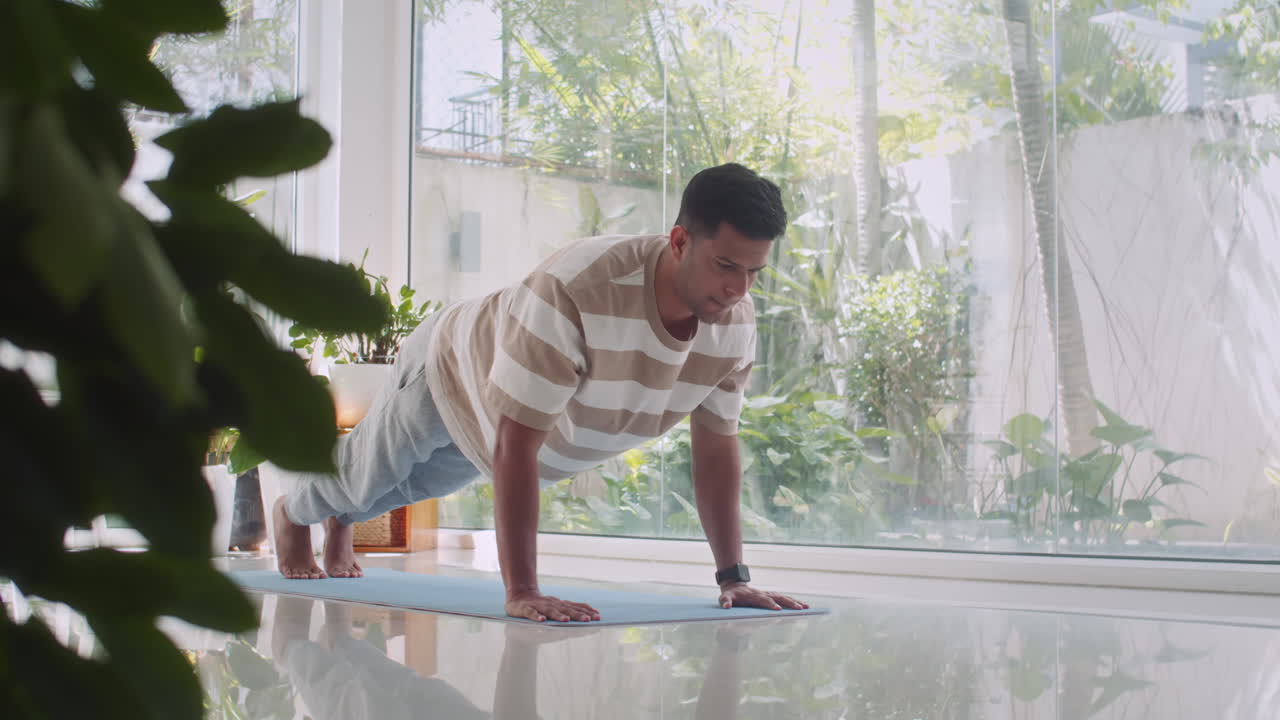 Athlete in Homewear Doing Push-ups on Floor