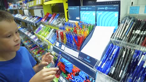 vinnitsa, ukraine - august 20, 2018: back to school. child is getting ready for school