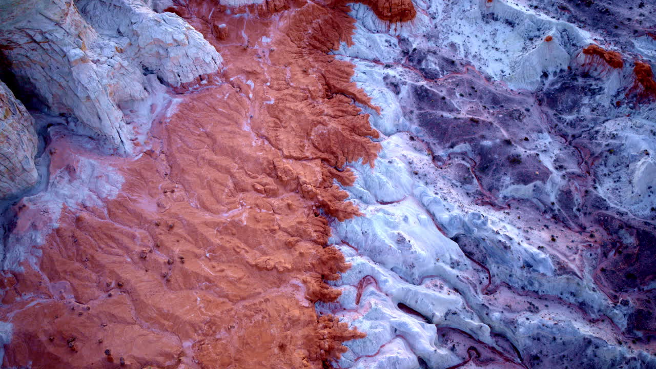 The drone slowly pans across the breathtaking landscape of colorful hills and towering hoodoos near the Utah-Arizona border.
