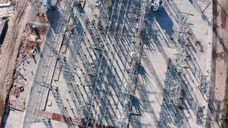 Drone-shot-of-electrical-grid-transmission-cables-and-power-lines