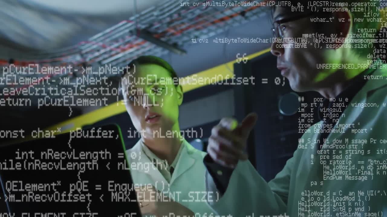 Animation of data processing over diverse woman and man working on laptop