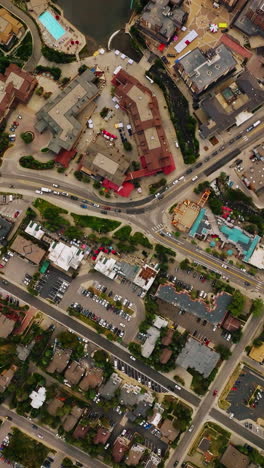 densely built little town of american state of colorado. aerial view of the busy streets of resort town in summer season. vertical video