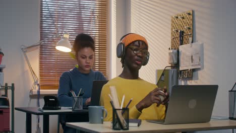 two students working from home in a cozy study space