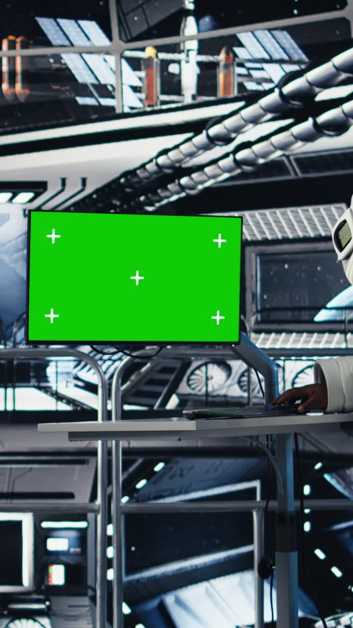 Vertical video Astronaut checks orbital navigation data in cockpit after completing expedition