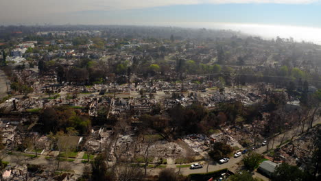 aerial view of neighborhood devastated by wildfire