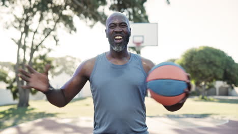 man playing basketball outdoors