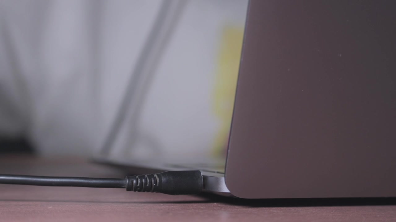Plug in a headphone to the macbook.