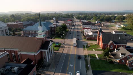 shepherdsville kentucky aerial with churches in foreground flying toward the courthouse