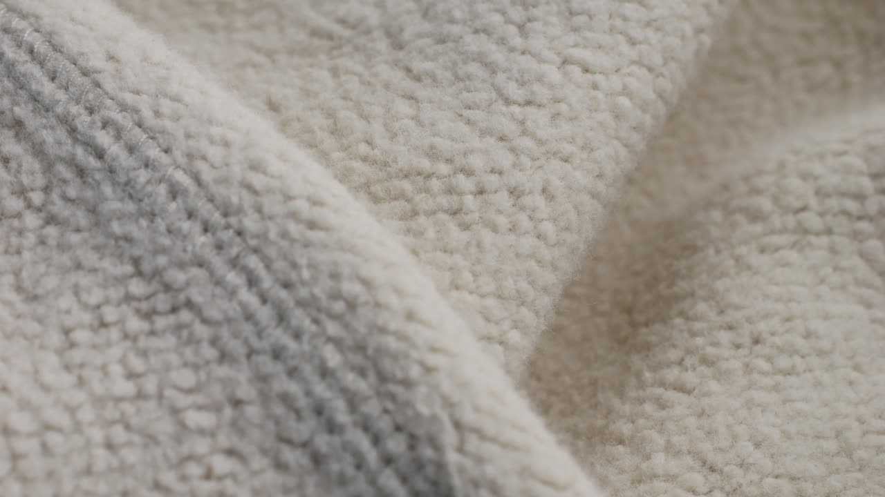 Grey textile cloth texture close-up macro. Fashion fabric multicolor. Cotton. High quality 4k footage