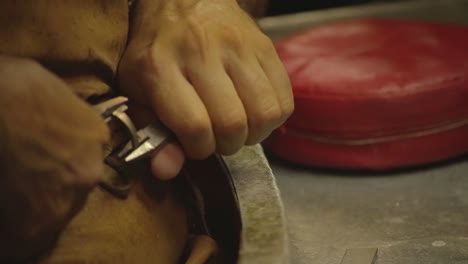 italian goldsmith at work building an engagement or a wedding ring