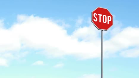 Signboard-post-with-stop-text-against-clouds-in-the-blue-sky