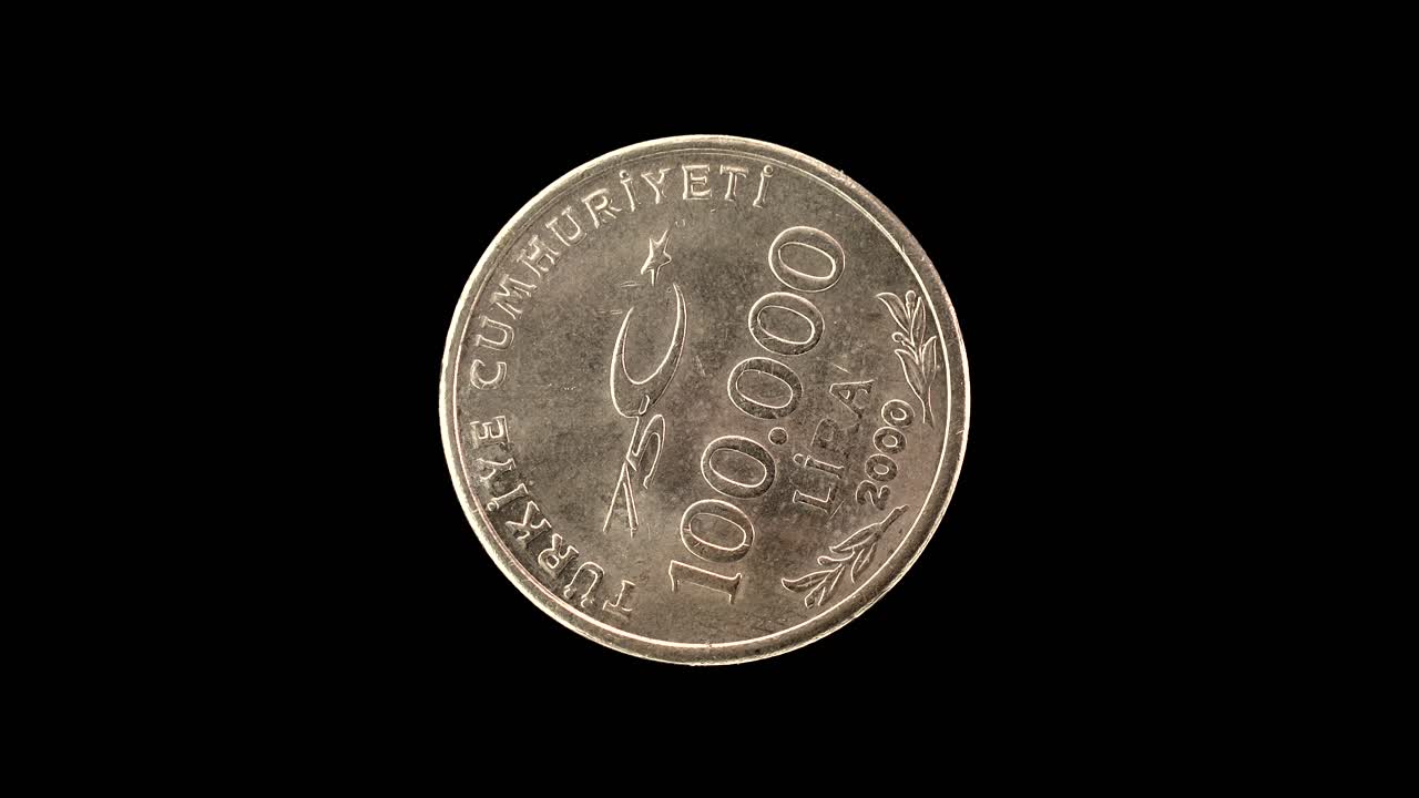 Turkey 2000 commemorative 100 000 lira coin obverse with crescent star and value rotating on black background