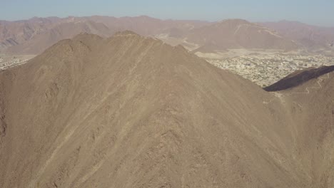 Breathtaking-drone-view-of-Al-Rabi-hiking-trail-showcases-Khorfakkan-city