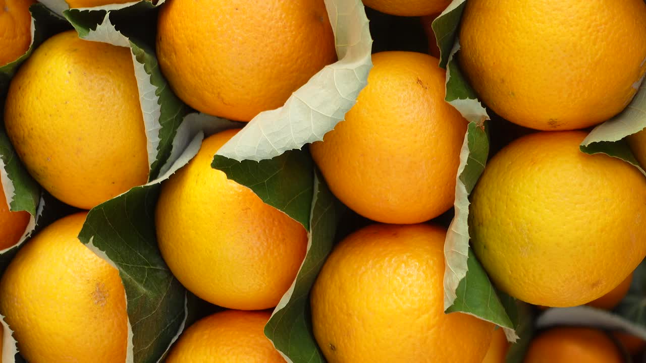 primer plano de una pila de naranjas