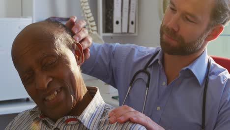 doctor examining a senior man in a retirement home