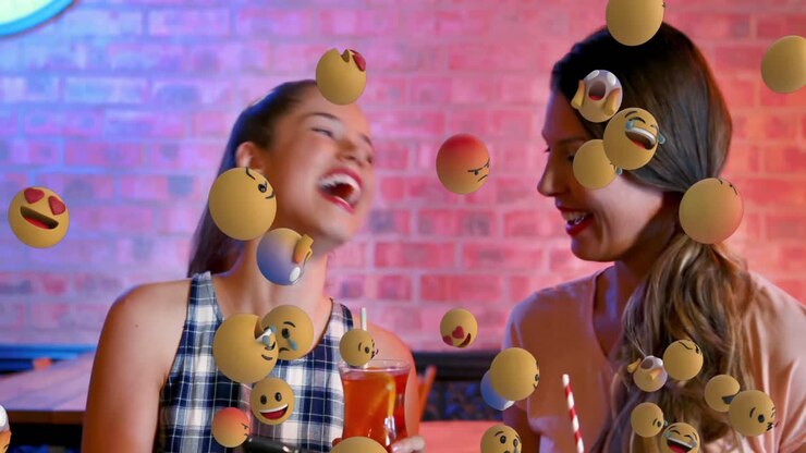 Emoji icons with friends taking a selfie in the background 4k