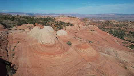 aerial view of colored sandstone patterns in utah desert, yant flat aka candy cliffs hiking trail