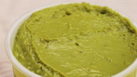 guacamole in a container