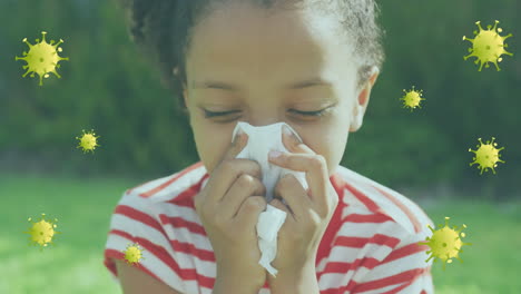 animación de células de virus sobre la nariz de una niña biracial que estornuda