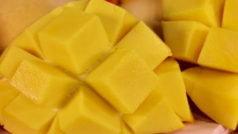 close-up of sliced mango with assorted fruits