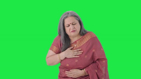 Sick-Indian-old-woman-suffering-from-cold-and-cough-Green-screen