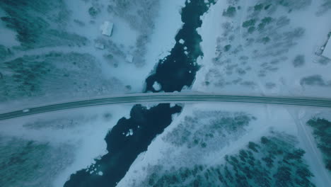 top view of a bridge over winter landscape in vikaköngäs, lappi, finland