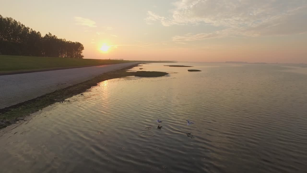 Scenic sunrise over a lake