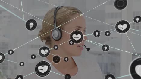 Animation-of-network-of-connections-and-icons-over-businesswoman-wearing-headset