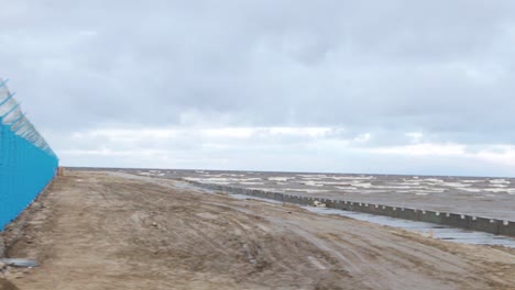 coastal construction project under cloudy weather