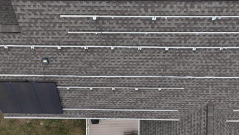 Solar-panels-on-residential-shingle-roof